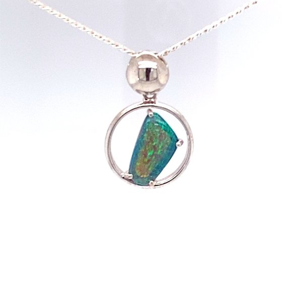 Bright Green opal encircled in silver