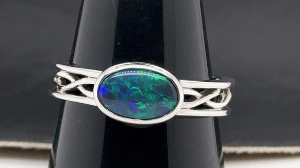 Celtic design solid black opal ring