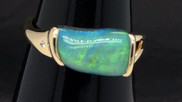 Freeform gem green opal in gold ring