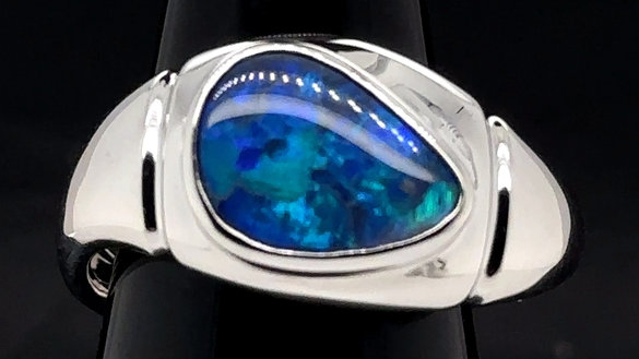 Large blue green opal in silver ring